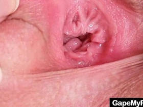 Fiery-haired vixen Denisa Heaven reveals her gaping pussy up close