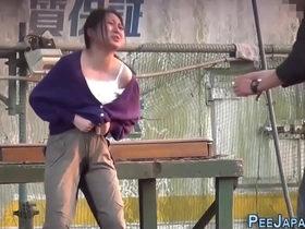 Japanese woman experiences a sudden urge to urinate in public