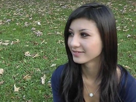 Dirty girl gets naked and sucks cock in public park